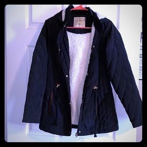 Black quilted and shearling jacket